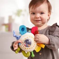 HABA Teether Cuddly Rainbow Round - Soft Activity Toy With Rattling & Teething Elements 13 HABA Teether Cuddly Rainbow Round - Soft Activity Toy With Rattling & Teething Elements -Baby Products GUEST 176b8a0d 160d 4aef 92be f171f2922b92